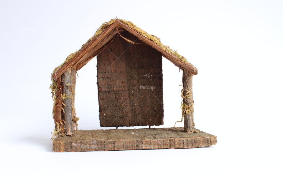 Empty miniature wooden house isolated