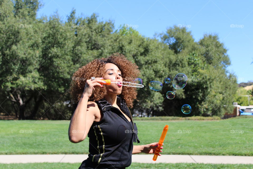 fashion model, blowing bubbles