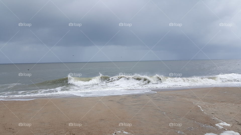 waves crashing on Edisto Beach, South Carolina because of tropical storm Bonnie