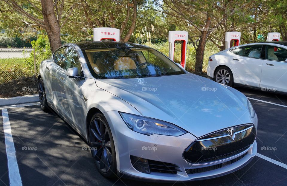 Tesla Model S Electric Car At Charging Station In Silicon Valley