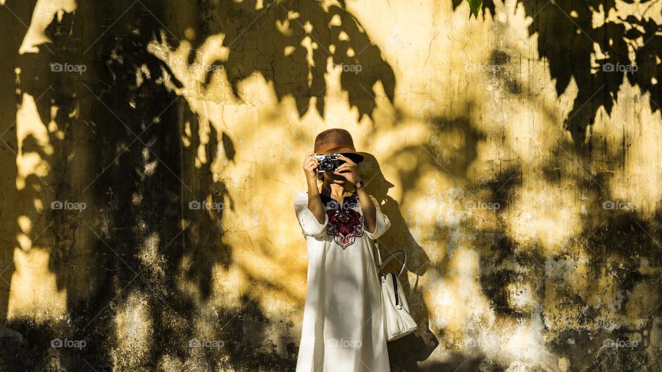 photographer in Hoian, the ancient town of Vietnam.
