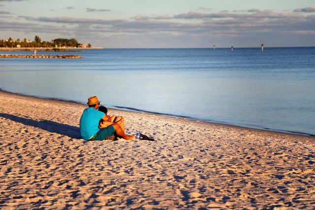 Watching the day go down!. At Key West's world famous beach, watching the sun going down behind the ocean! 