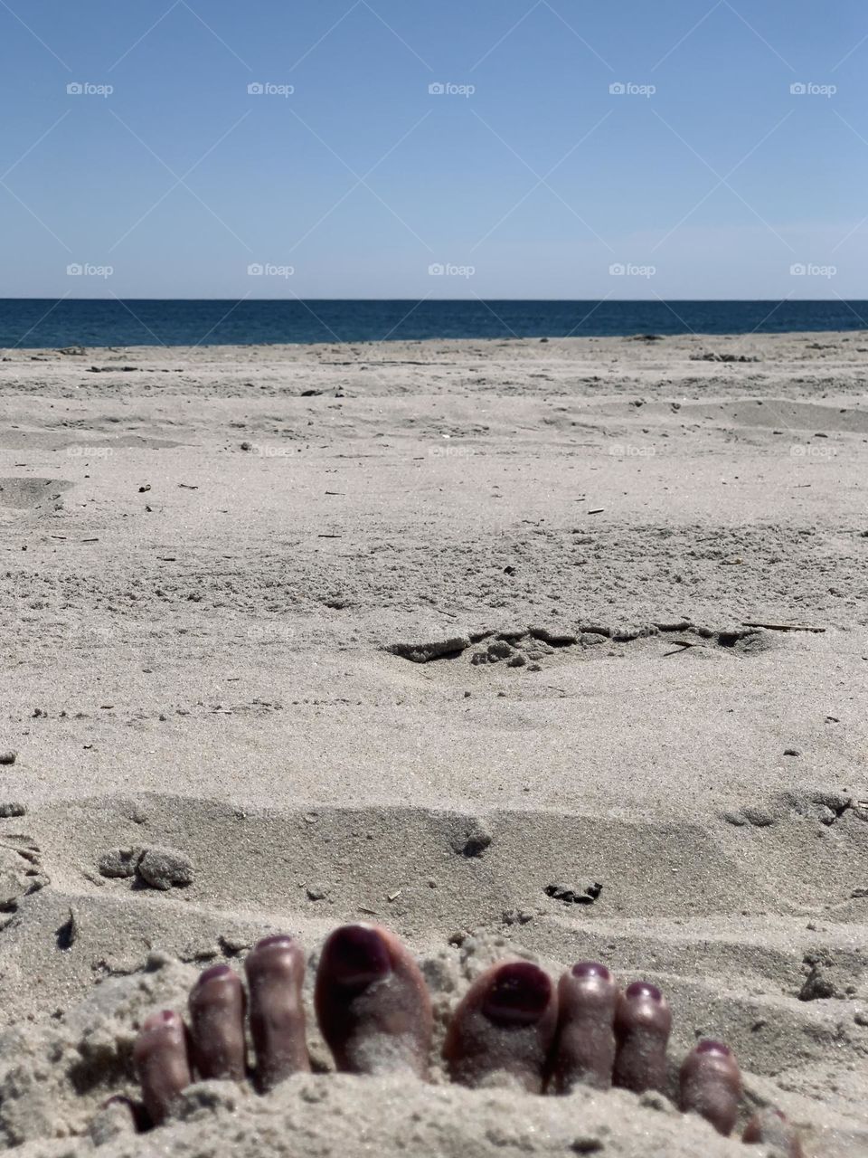 Feet under the sand 