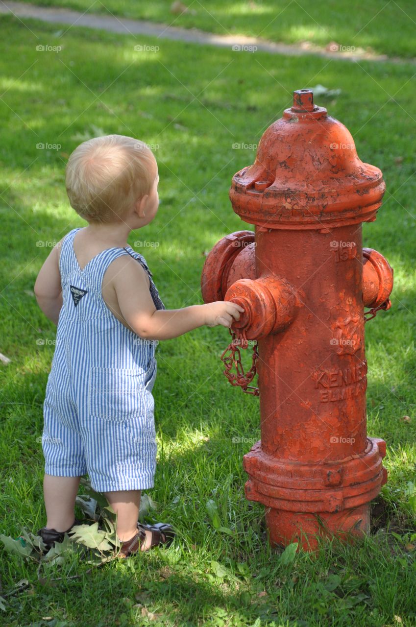 Boy with fire hydrants 