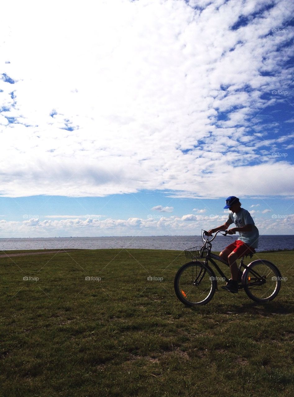 Biker by the ocean.