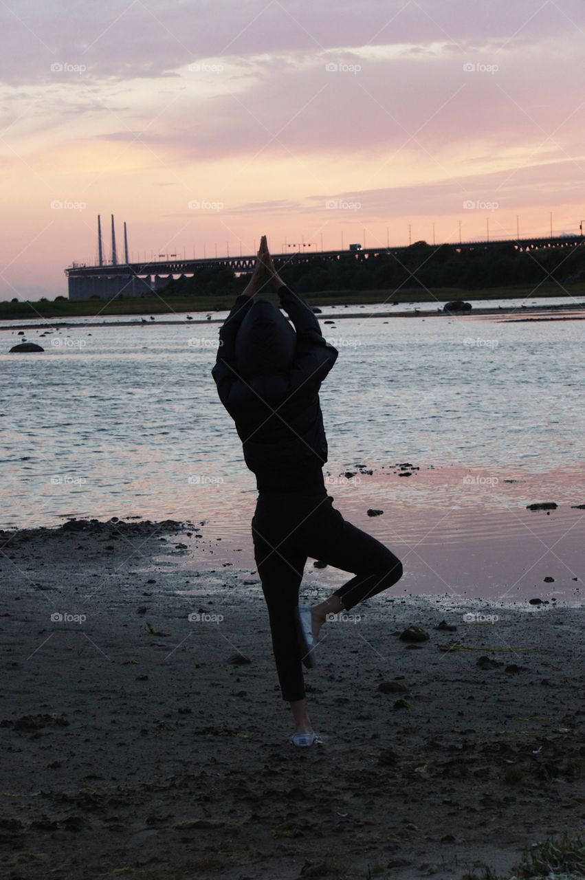 Yoga by the bridge