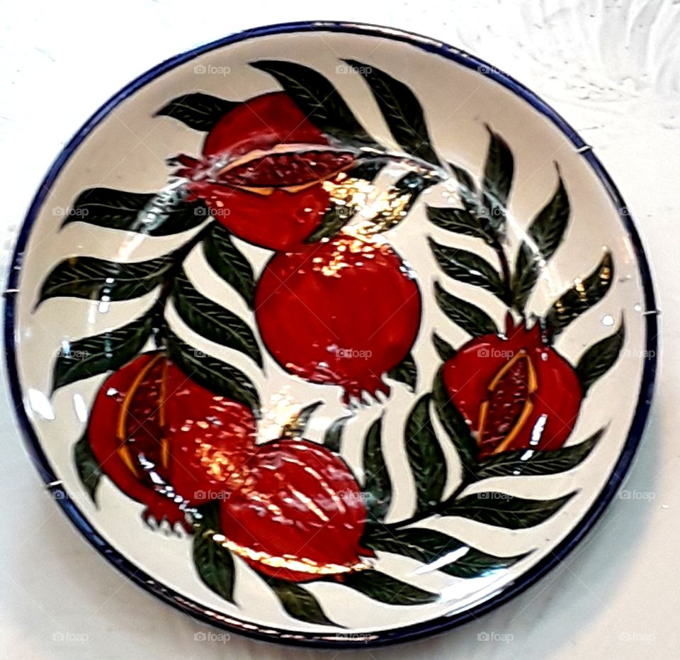 Russian traditional plate on the white wall