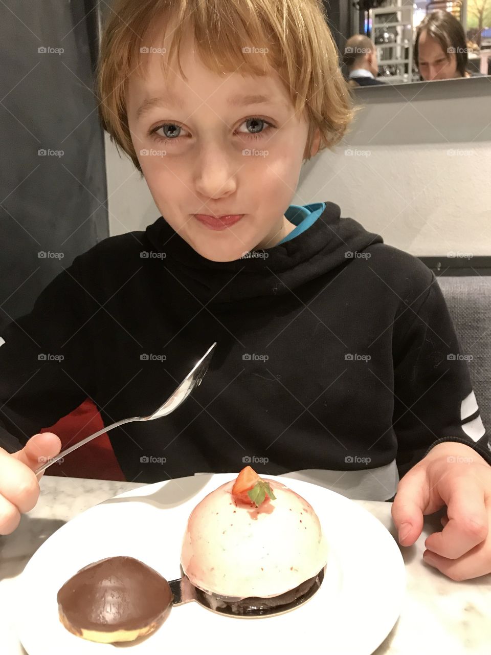 Child enjoying dessert