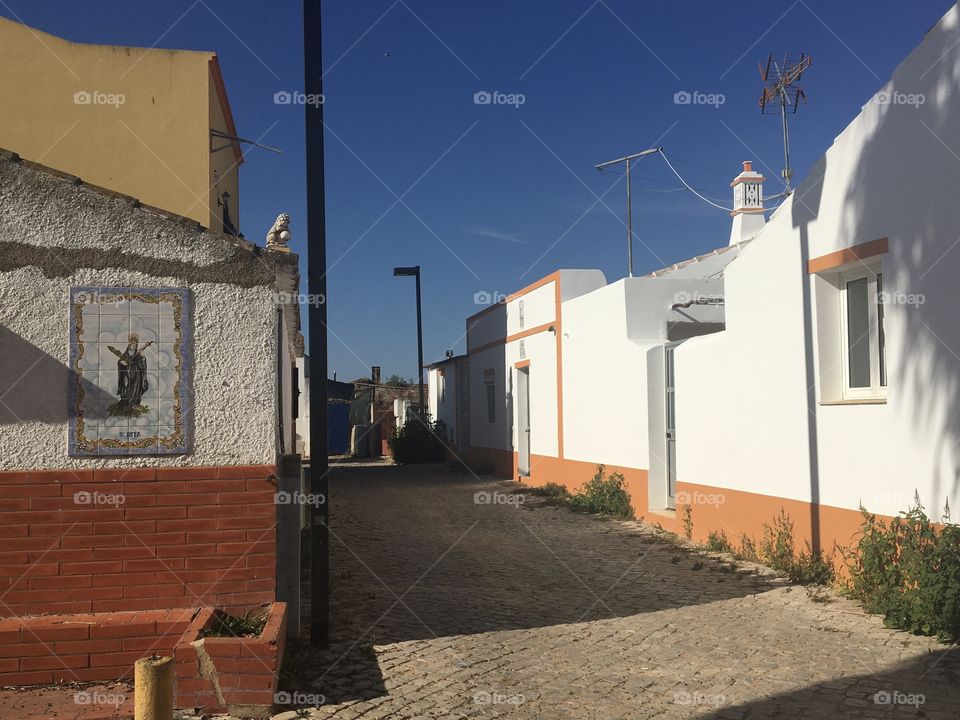Light and shadows on traditional houses from Algarve village 