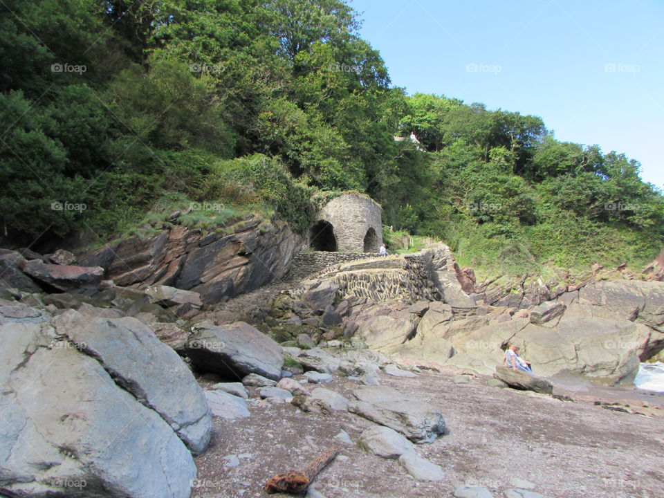 Lime kiln ruins on overlooking beach