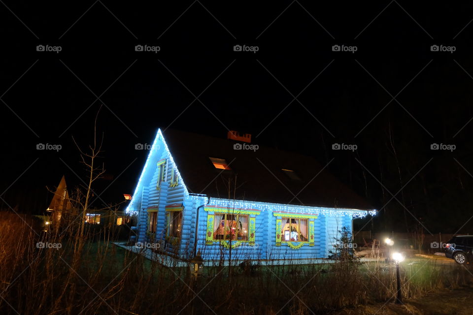 Wooden house at night