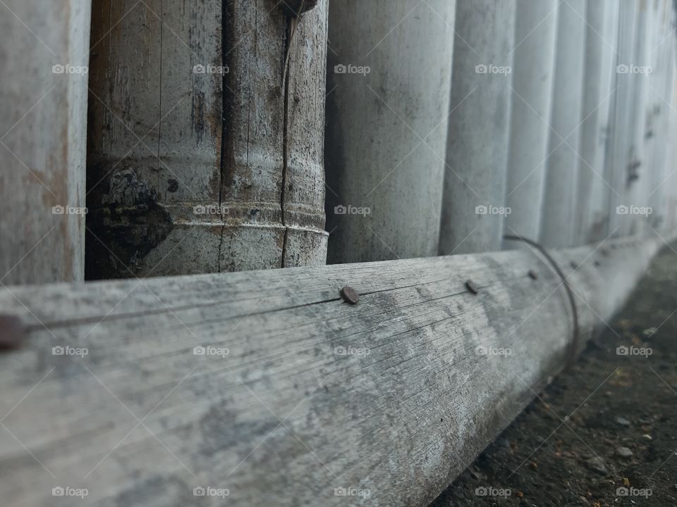 An abstract background of bamboo walls.