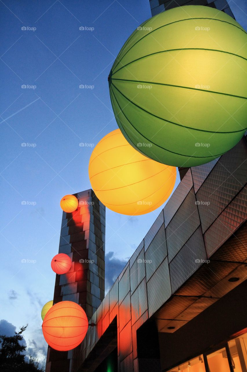 Colourful Building Lights. Large, colourful lights attached to the side of a building.