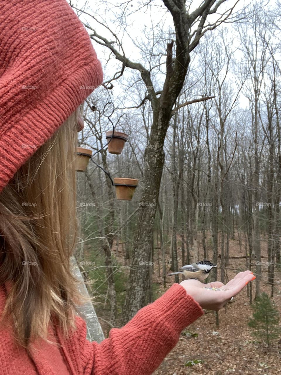 Ms. Nature; Woman with a chickadee that landed on her hand