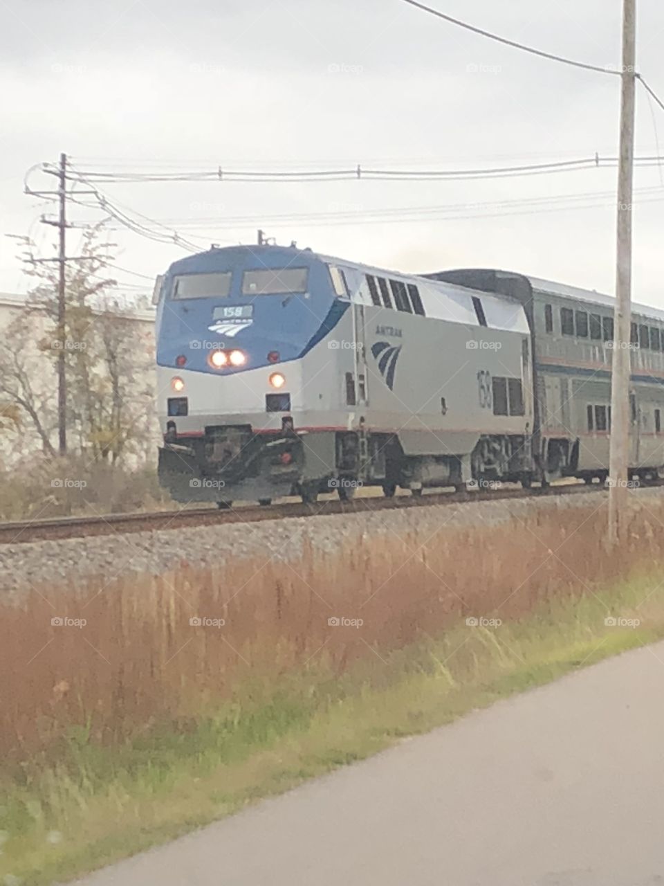 The City of New Orleans   train going by us , in our little town. 