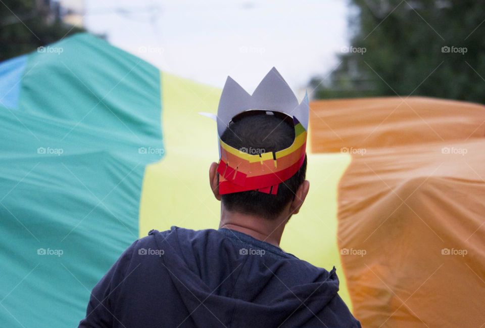 Man with paper crown on the Pride