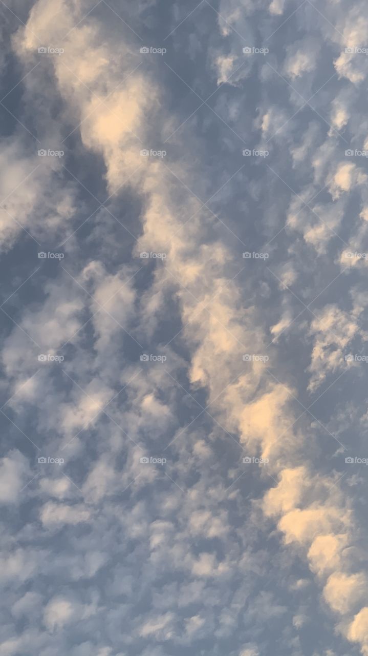 Straight clouds, blue sky, fluffy, wavy, space, weather, air, wind, nature’s beauty.