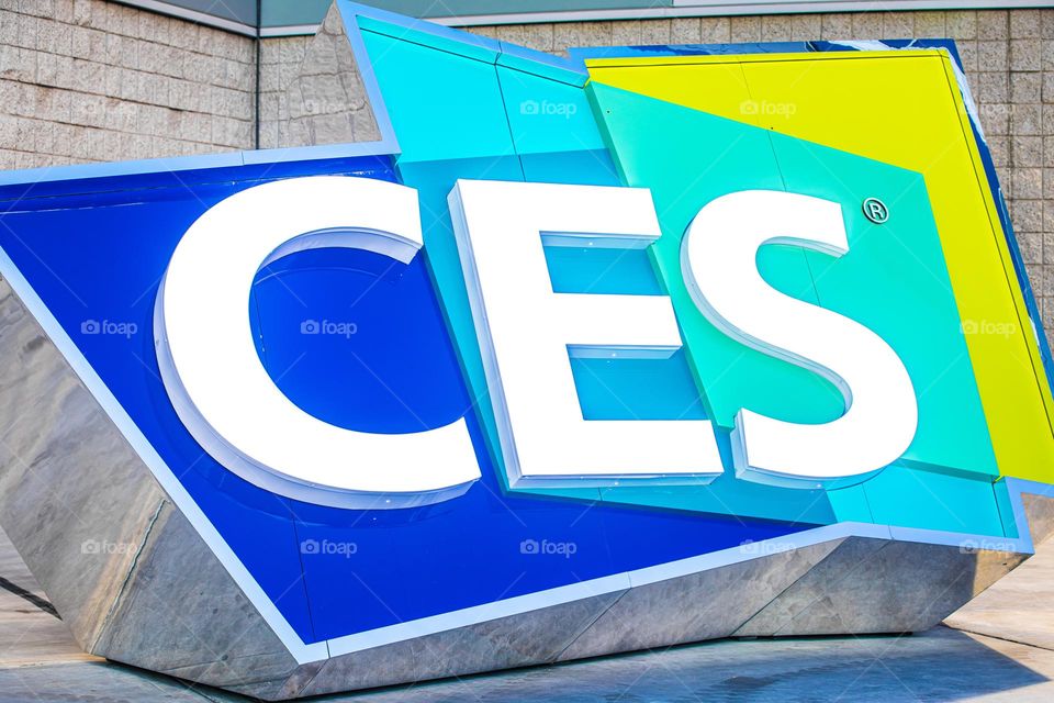 Las Vegas, NV 1-6-2023: Large logo of CES outside the entrance of LV Convention Center. Held annually, CES is the largest consumer electronics convention in the world. Vibrant cool colors on the sign.