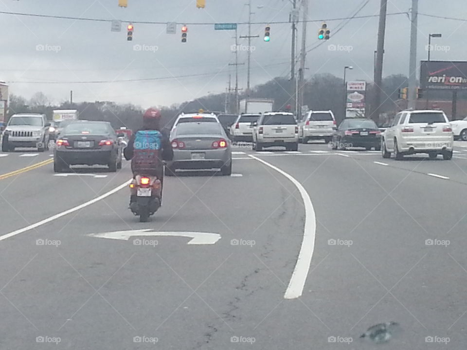 Lady on Moped