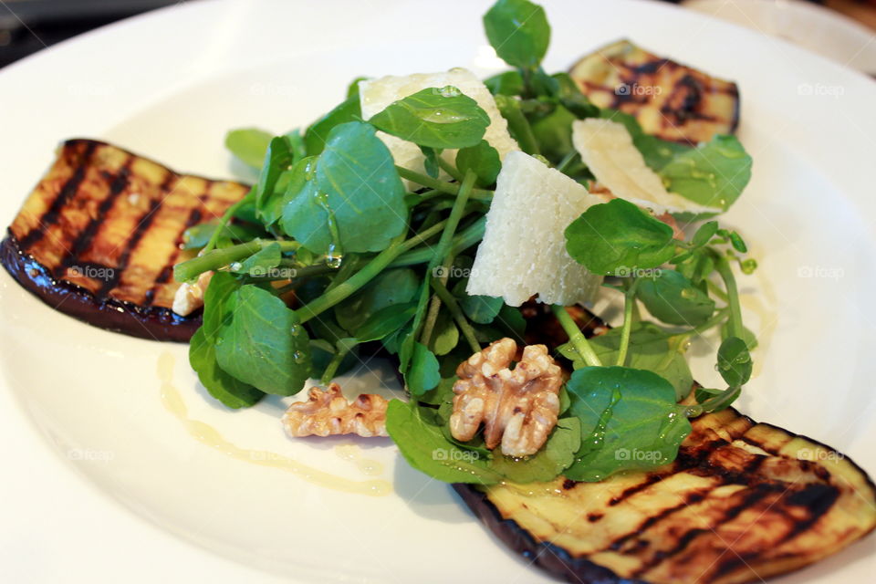 Grilled eggplant with Parmesan and honey dressing