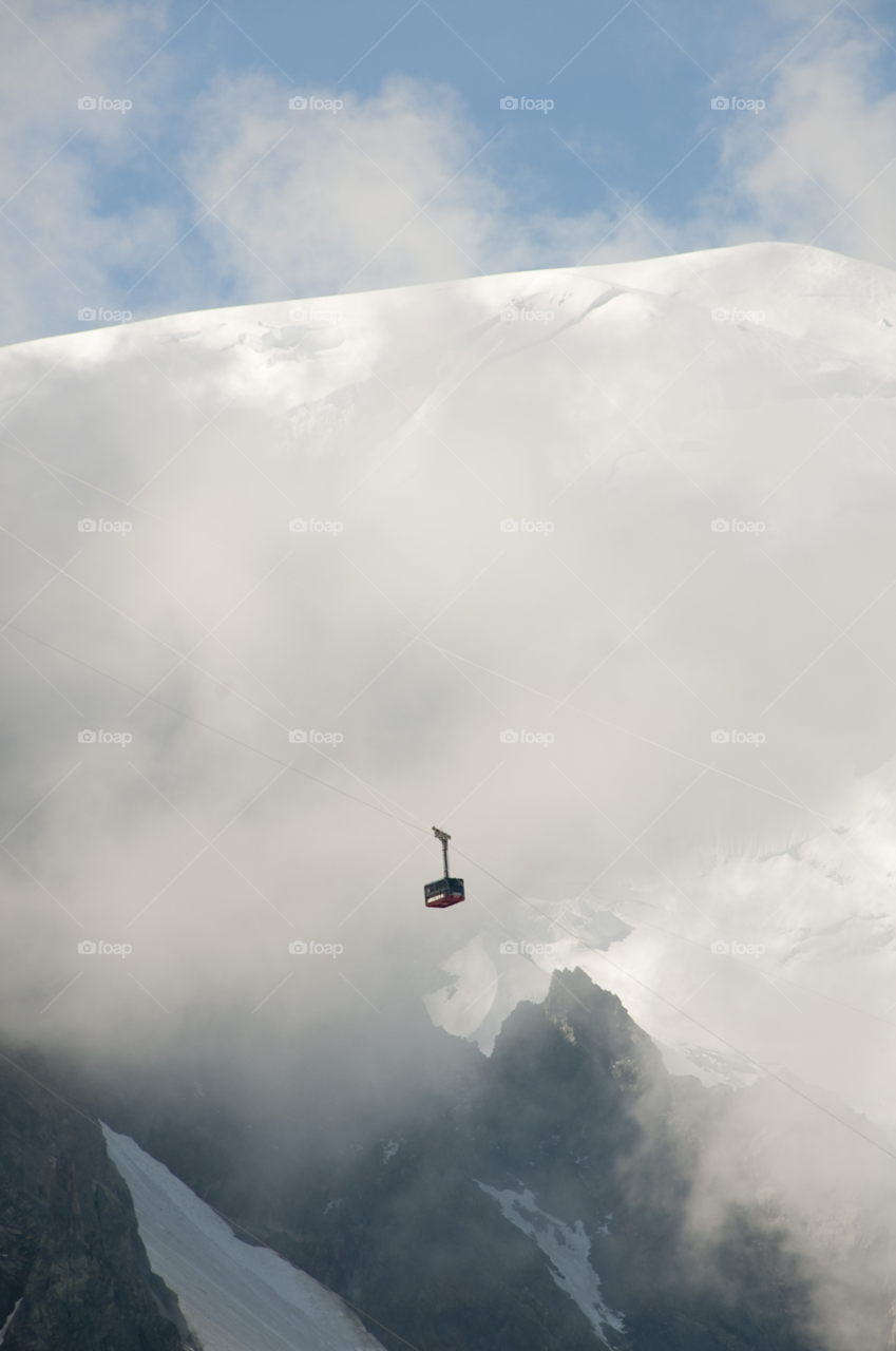 mont blanc chamonix france winter clouds tram by bobmanley