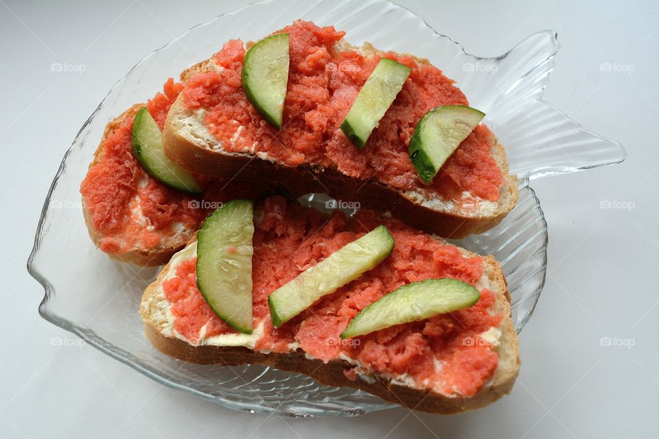 sandwiches with red fish and cucumber