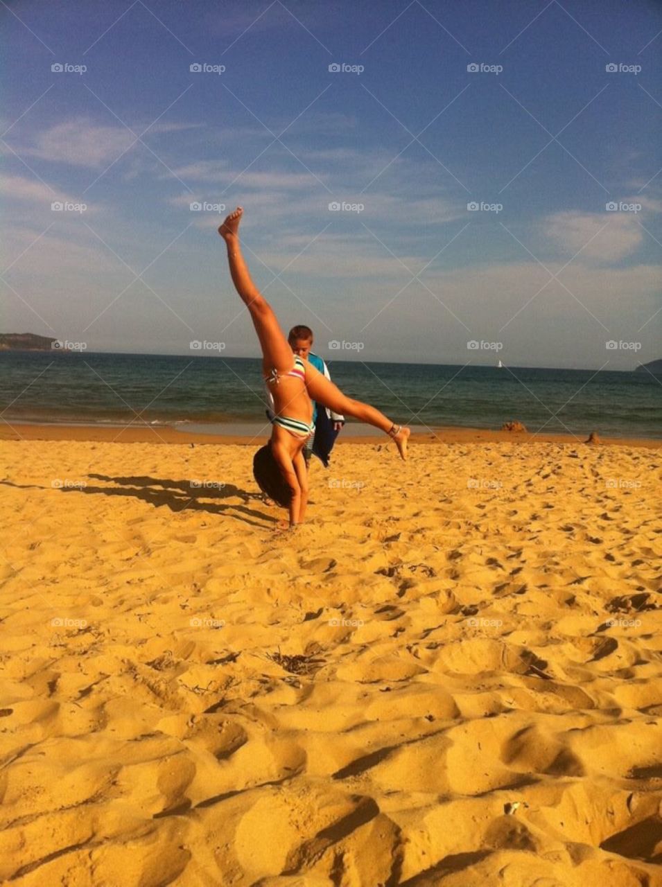 Handstand on the beach 