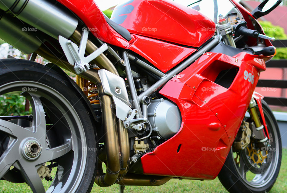 red ducati 996s motorcycle outdoors