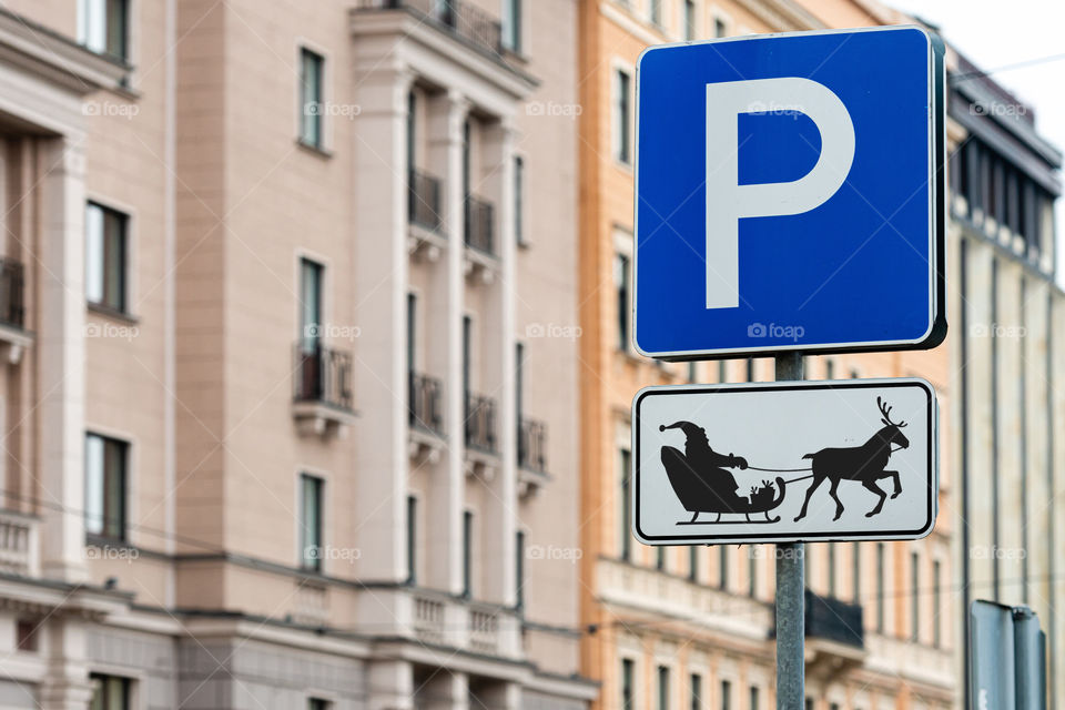 A parking sign for Santa reindeer and sleigh, new year - christmas concept
