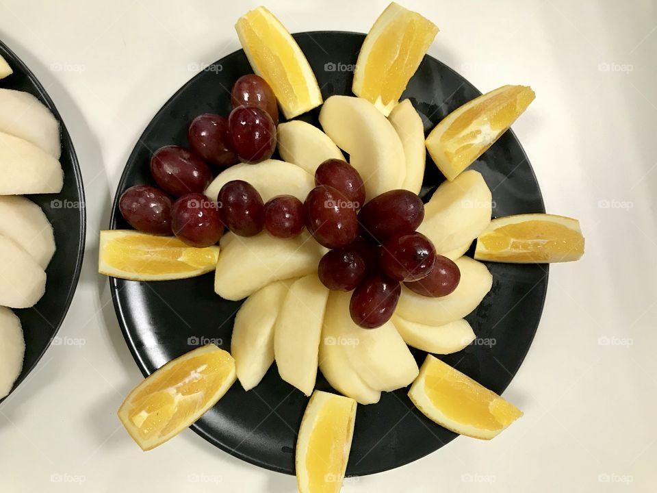 mixed fruit on the dish like healthy trendy 