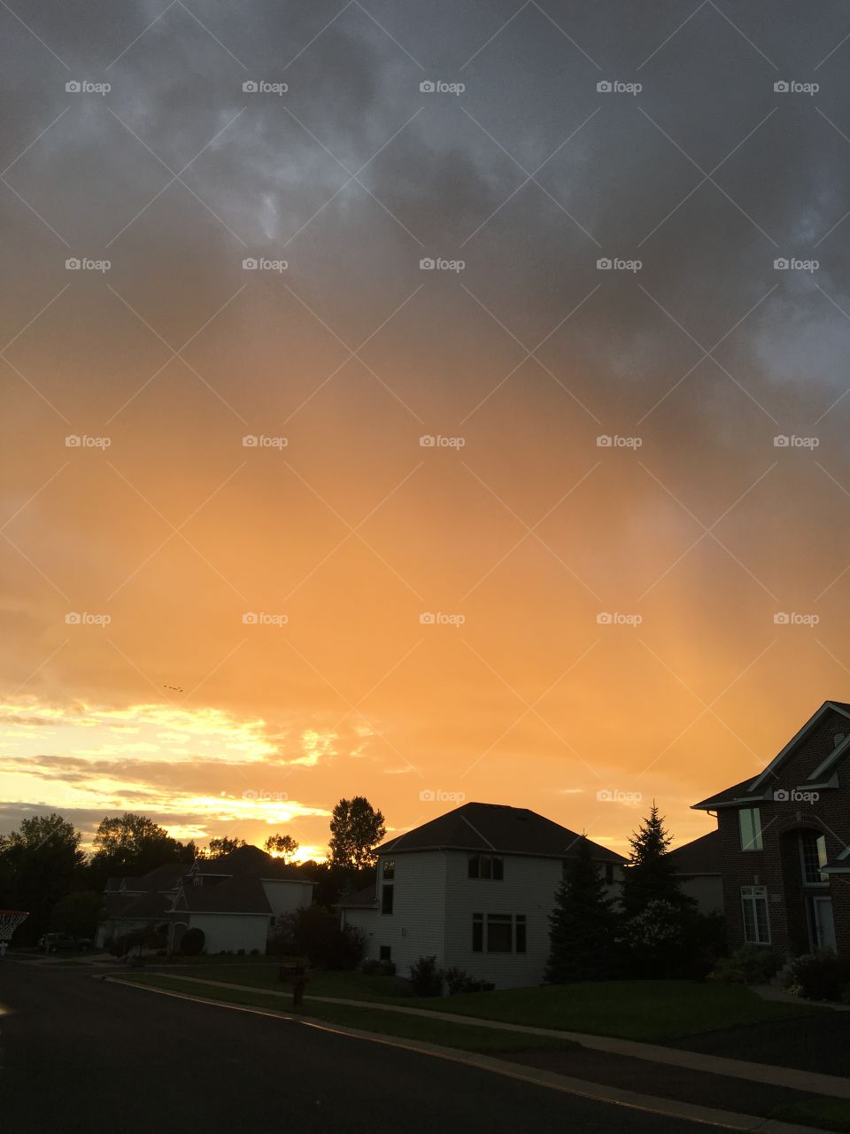Orange cloudy bright sunset