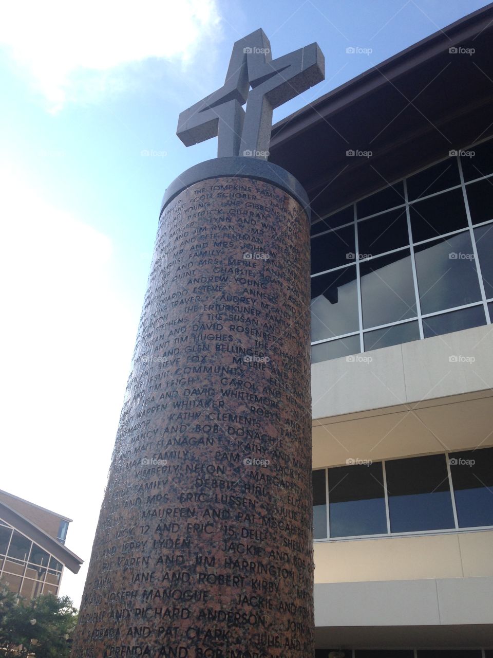 Fountain of life. Cross fountain at private school