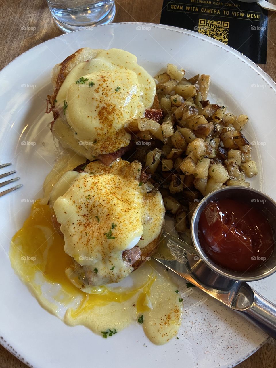 A yummy traditional eggs Benedict, and a side of golden delicious potatoes! 