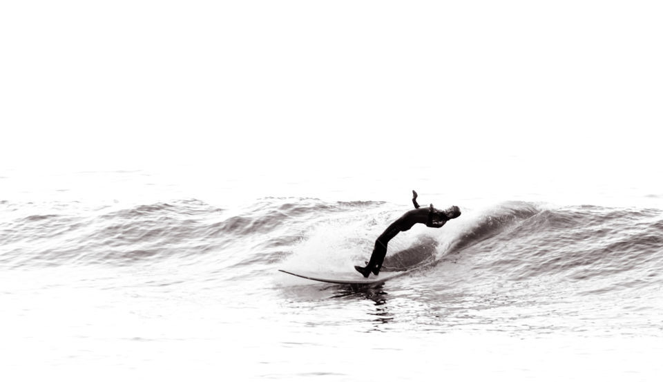 arctic surfer at Undstad in Lofoten