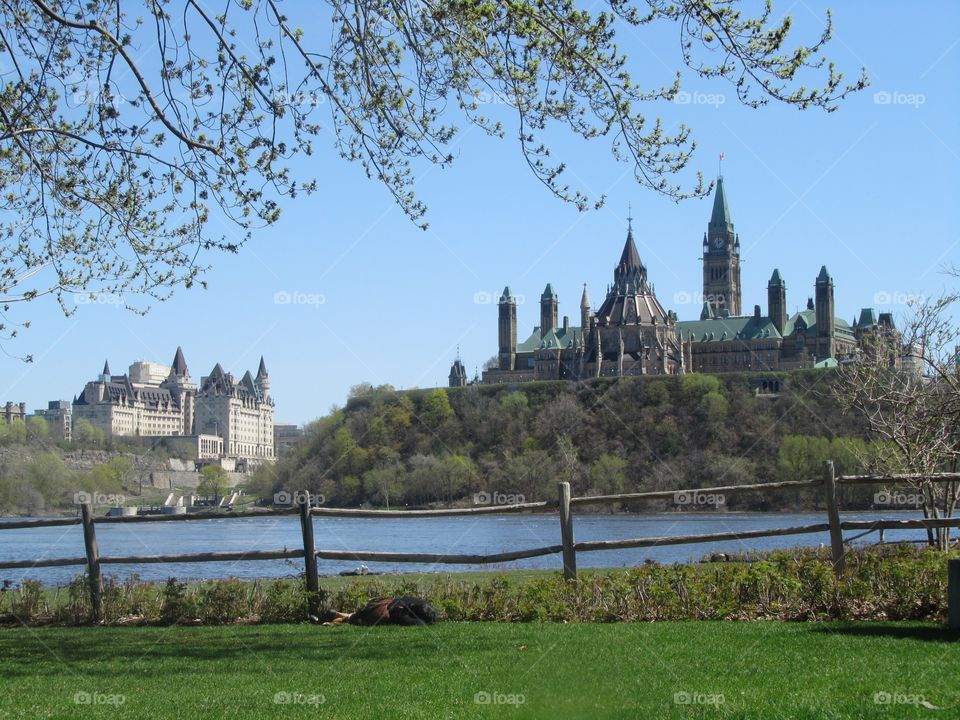 
view of parliament hill in Ottawa from the quebec side in Gatineau across the Ottawa river