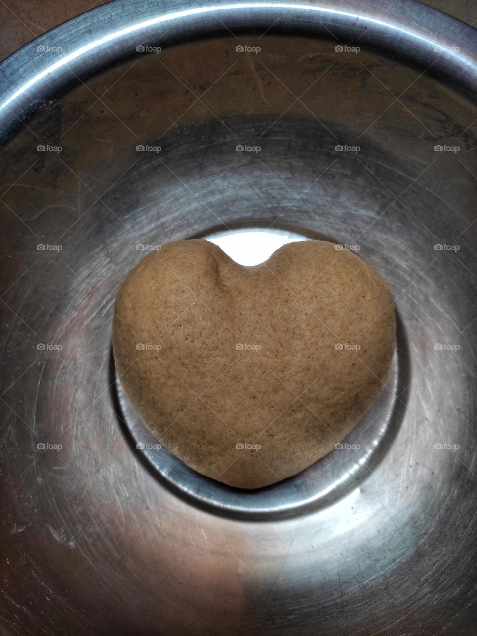 the dough in heart shape.