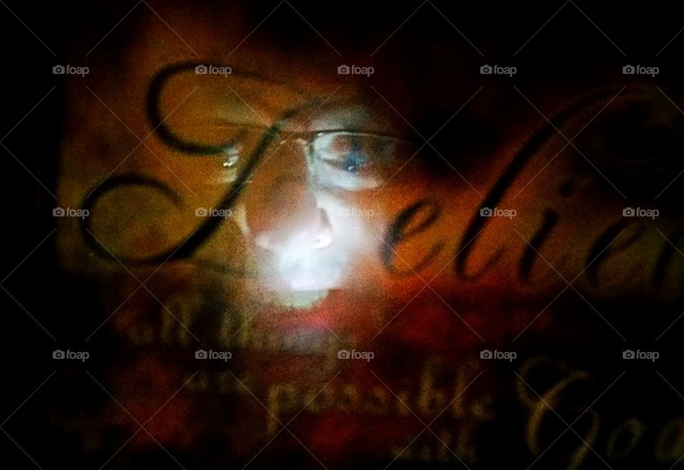 face reflection on glass