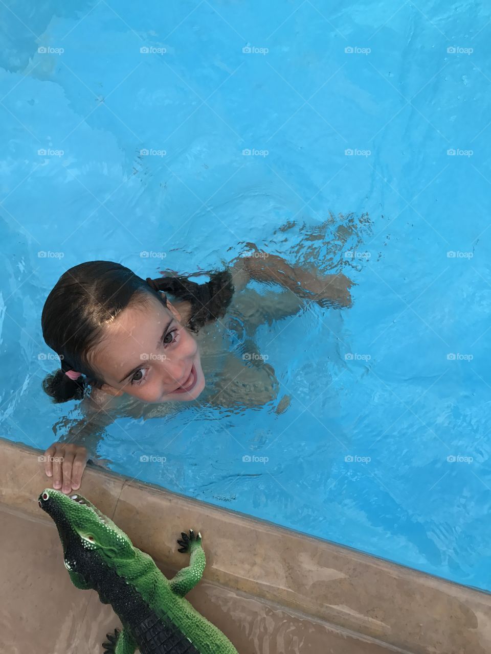 Little girl in a pool