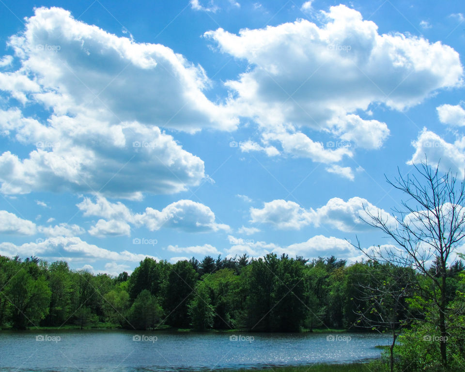 Blue sky against lake