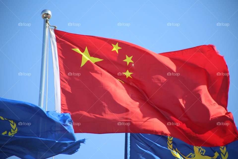 The flag of China waving in Shanghai.