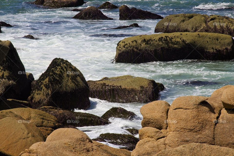 waves crashing on rocks