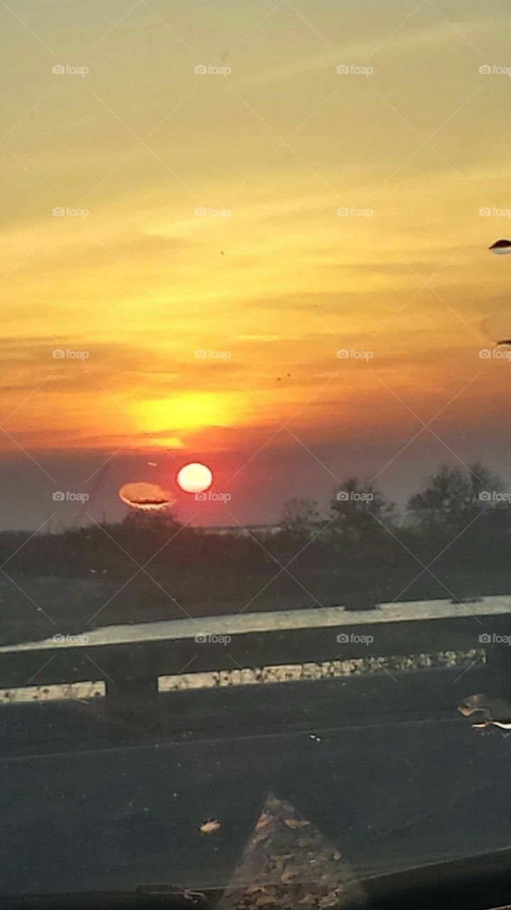 Jersey Shore Sunsets. Cruising over the bridge in my car and had to take this picture