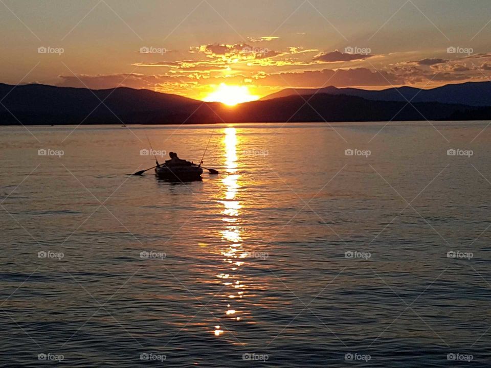Fishing on the lake at sunset Idaho