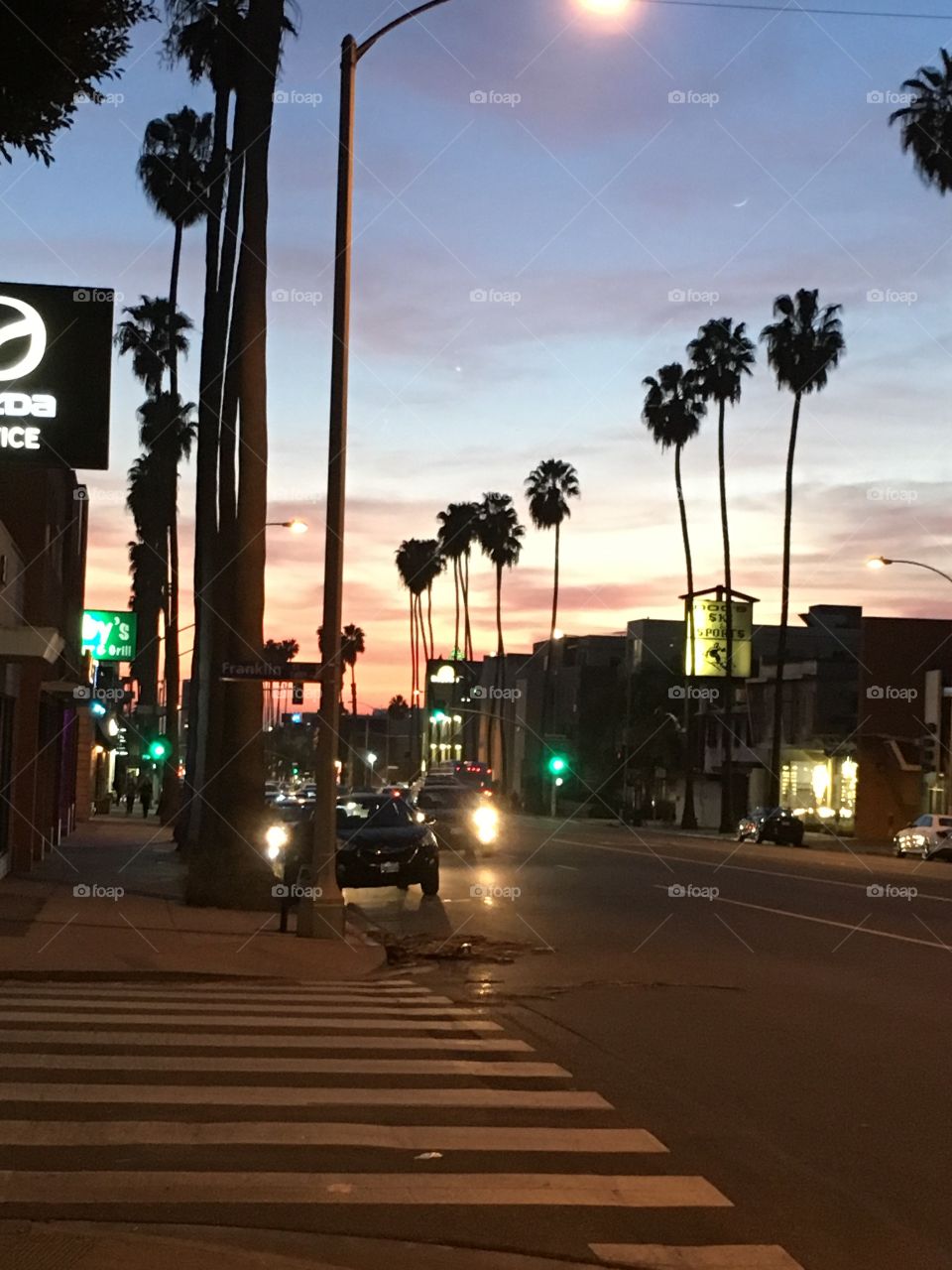 Sunset on a beautiful LA night. Santa Monica. Chill vibe. Happy people. Warm, relaxing, beach town