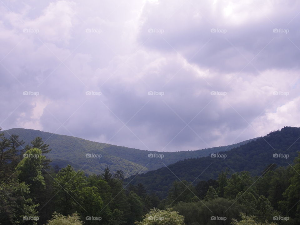 Mountain and skies