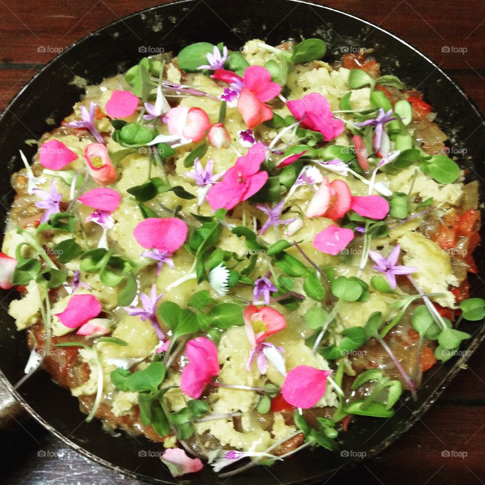 Omelette with microgreens and edible flowers.