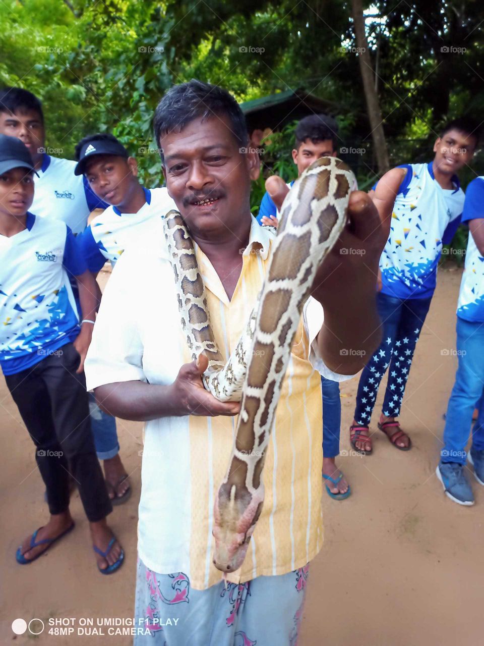 The man with the python .