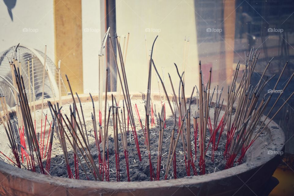 Incense of burning Thai wishes.