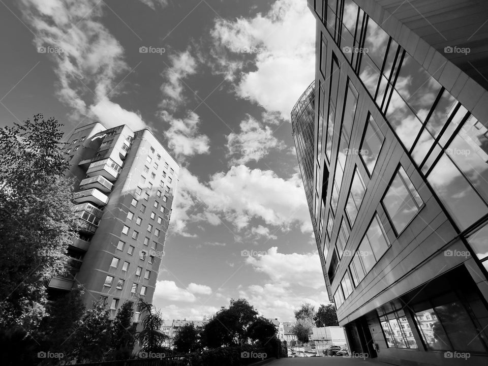 Old versus new. Old building in a city next to newer architecture.