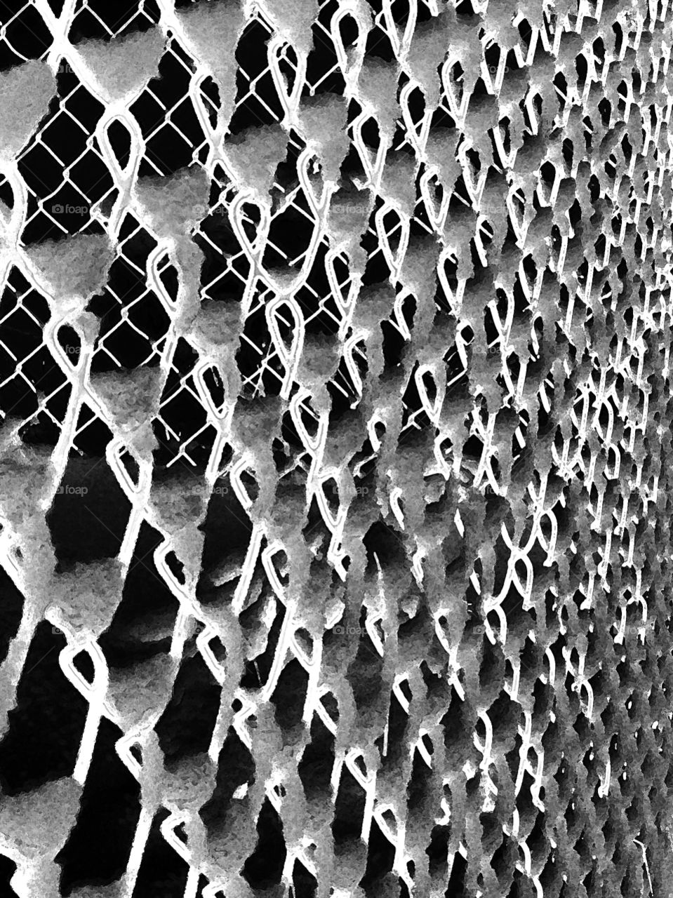 It was an abstract day today and i was taking some of my ice and snow pictures and experimenting with some desktop techniques and tools. This is a black and white  abstract of snow on a chainlink fence. 